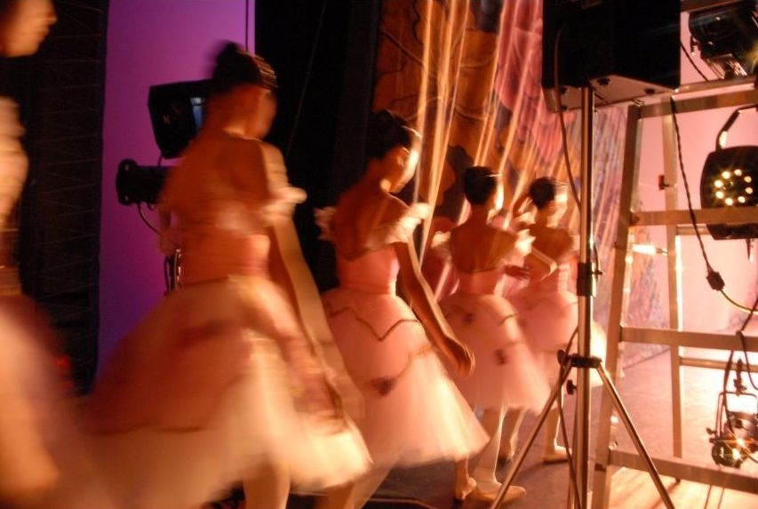Onstage at a live performance —book international concert travel with VIP seating.